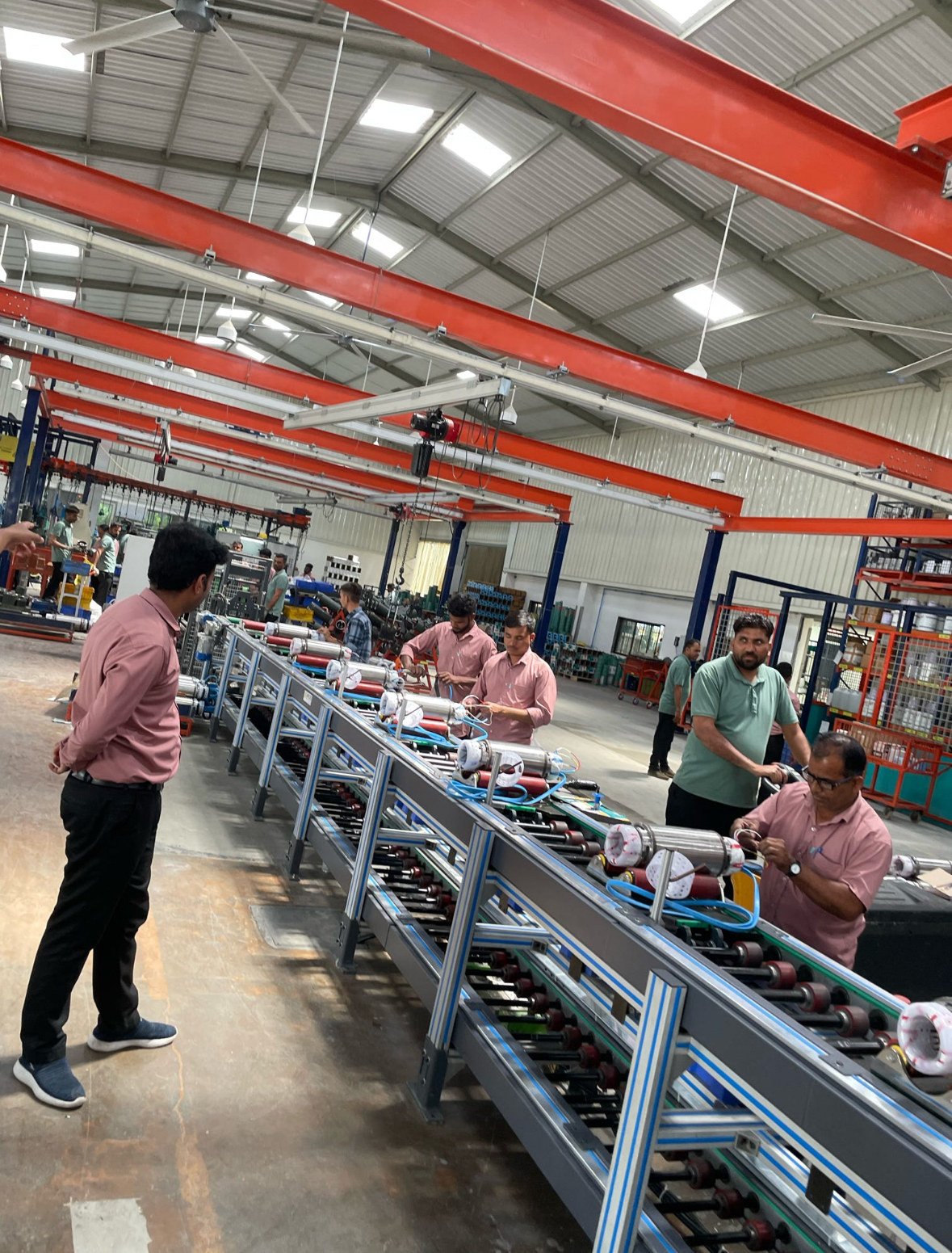 Medical device manufacturing facility showing precision assembly line work